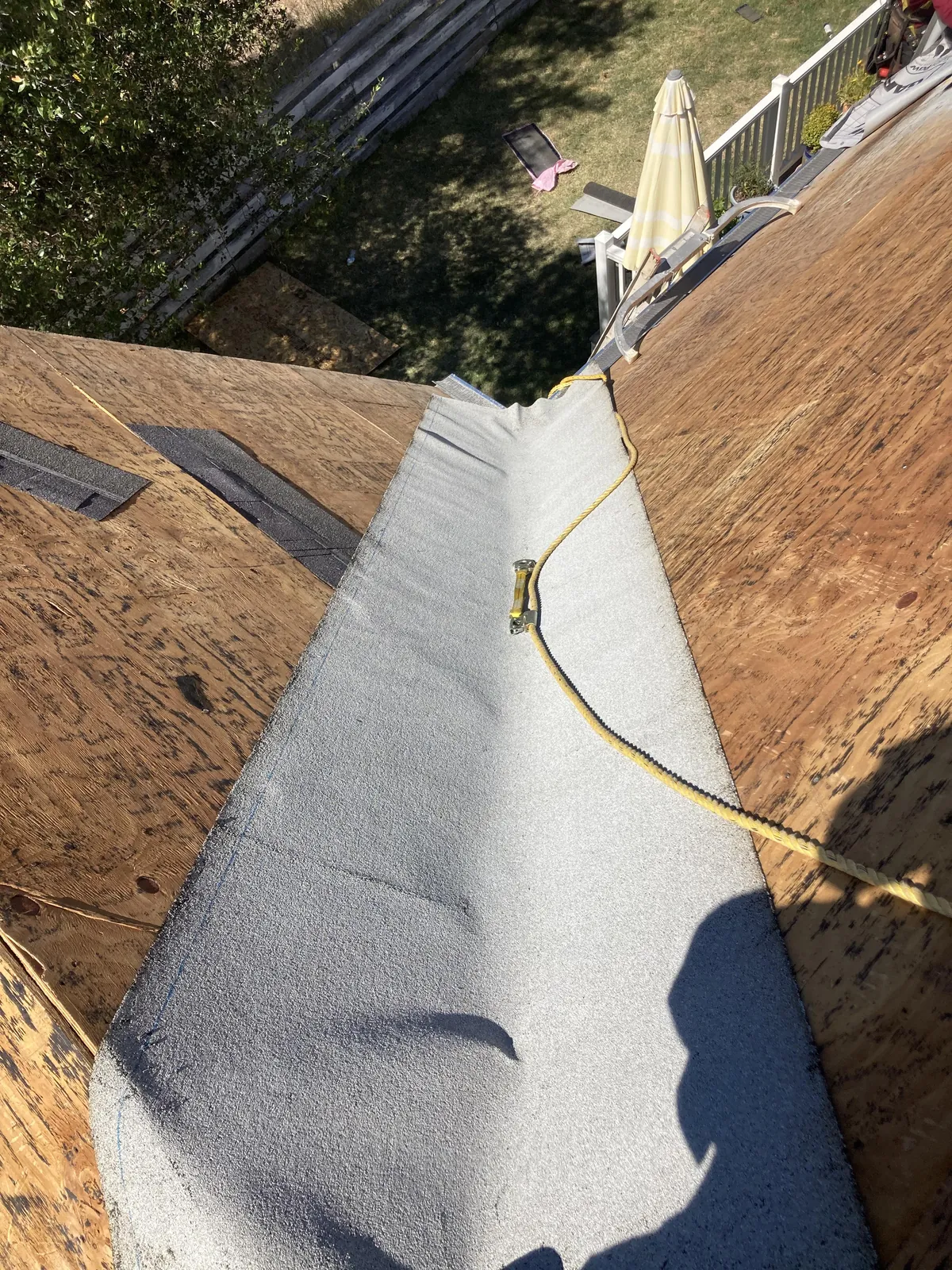 Roof valley with underlayment installed and clean, straight seams